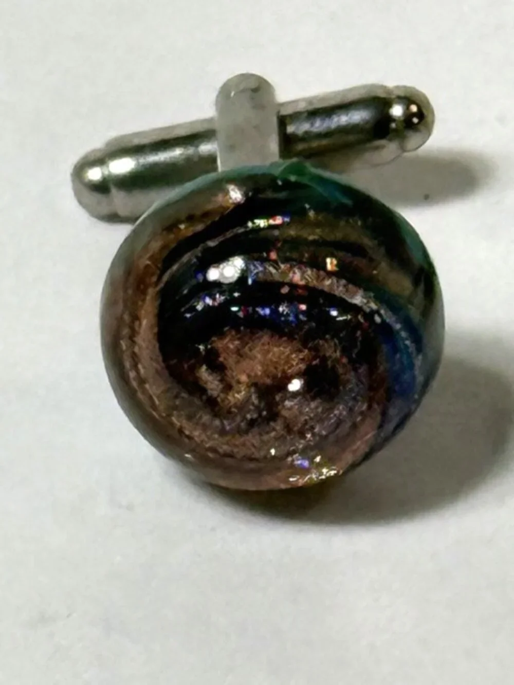 Dichroic glass men's cuff links.